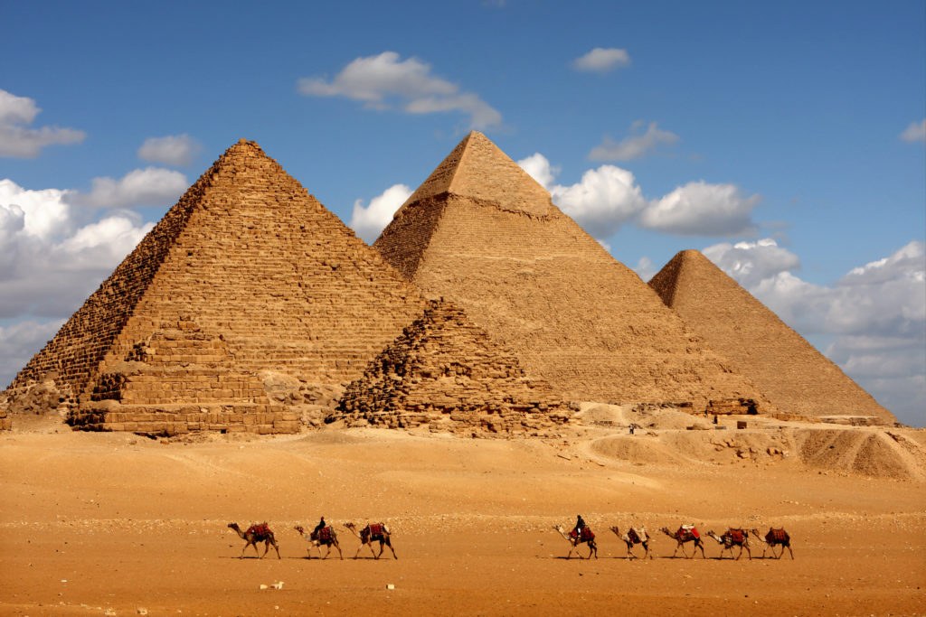 Pyramids Giza Cairo In Egypt With Camel Caravane Panoramic Scenic View